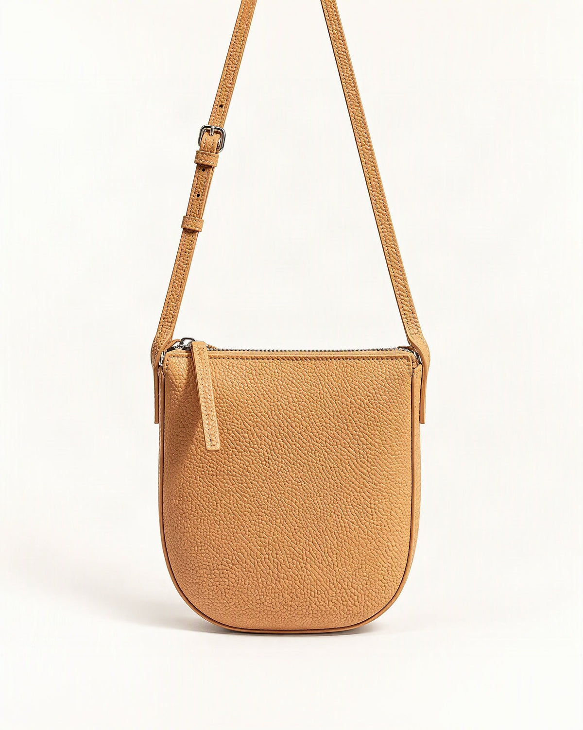 Cowhide Leather Mini Crossbody Phone Bag — straight-on front view on a warm white background