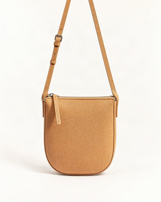 Cowhide Leather Mini Crossbody Phone Bag — straight-on front view on a warm white background