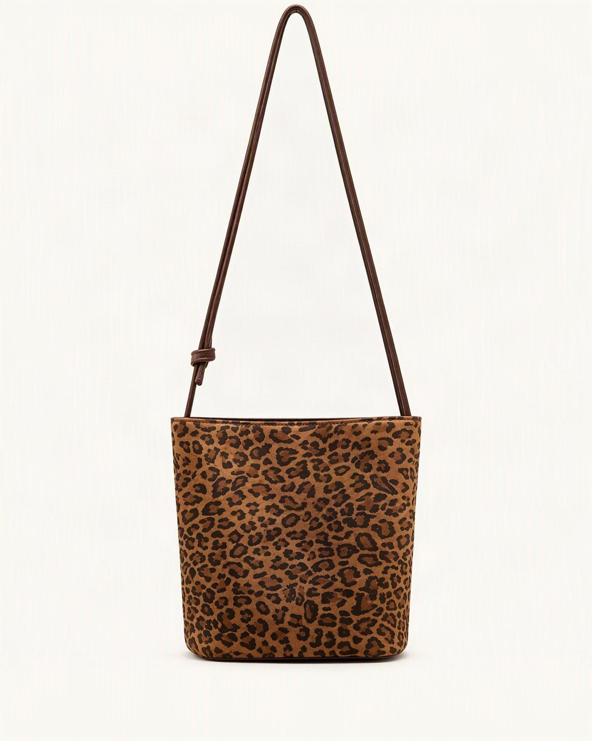 Nubuck Cowhide Bucket Crossbody Bag — straight-on front view on a warm white background