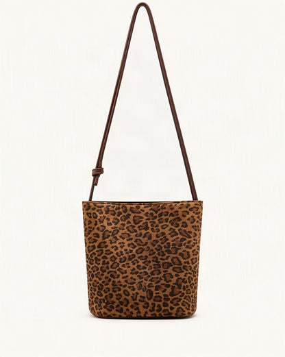 Nubuck Cowhide Bucket Crossbody Bag — straight-on front view on a warm white background
