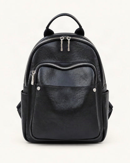 Top-Grain Cowhide Small Backpack — straight-on front view on a warm white background