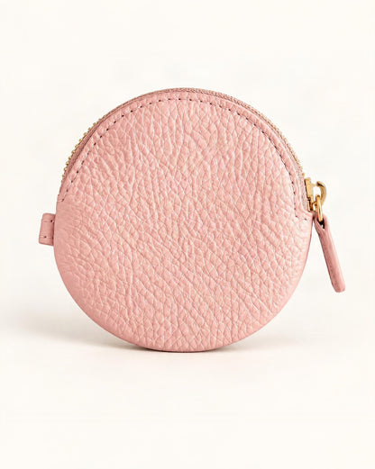 Cowhide Leather Mini Round Zip Pouch — straight-on front view on a warm white background