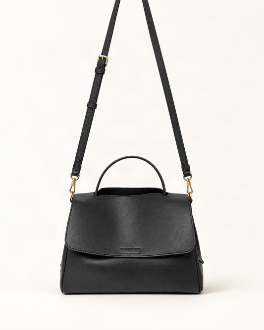 Cowhide Leather Mini Top-Handle Crossbody Bag — straight-on front view on a warm white background
