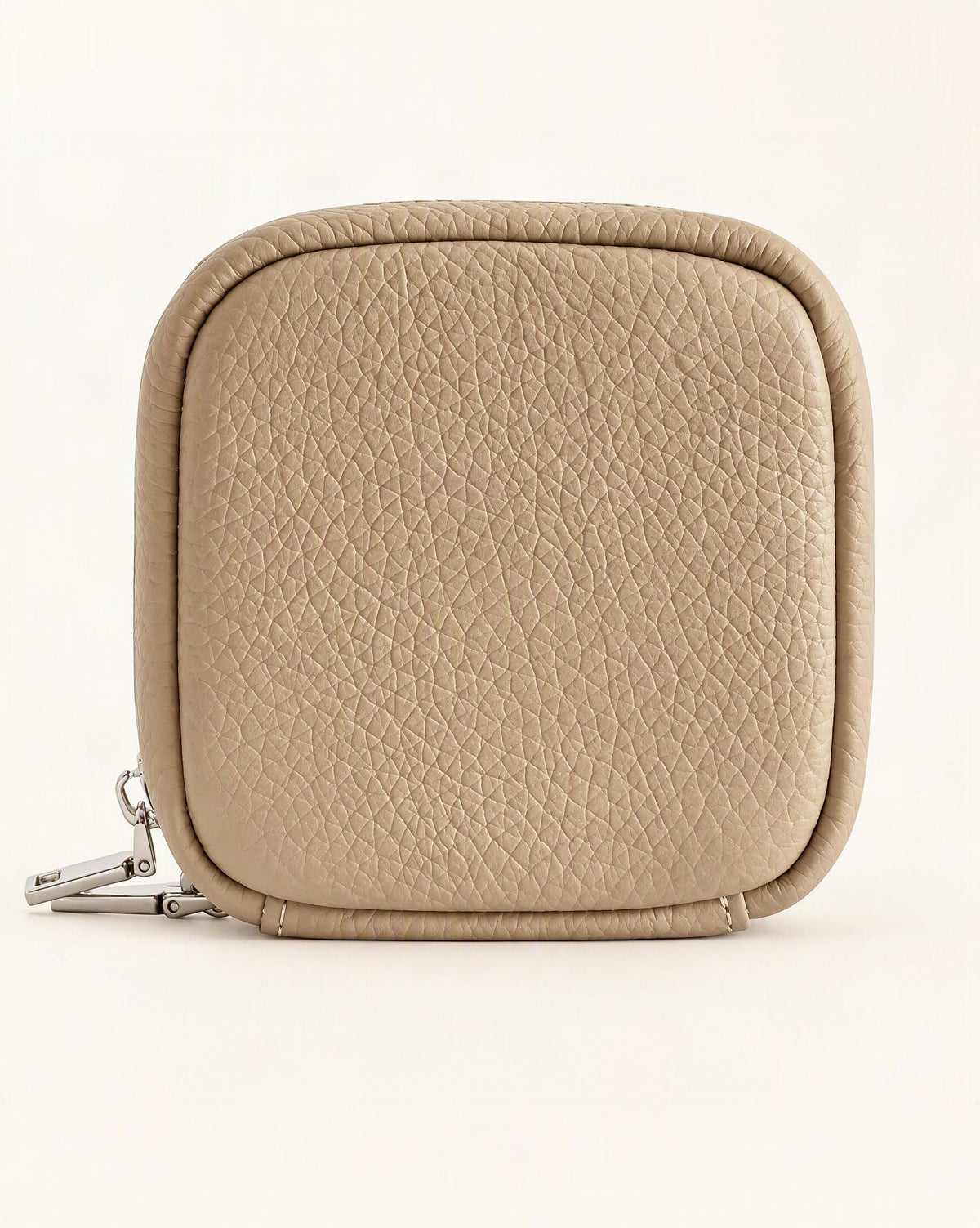 Pebbled Leather Mini Cosmetic Pouch — straight-on front view on a warm white background