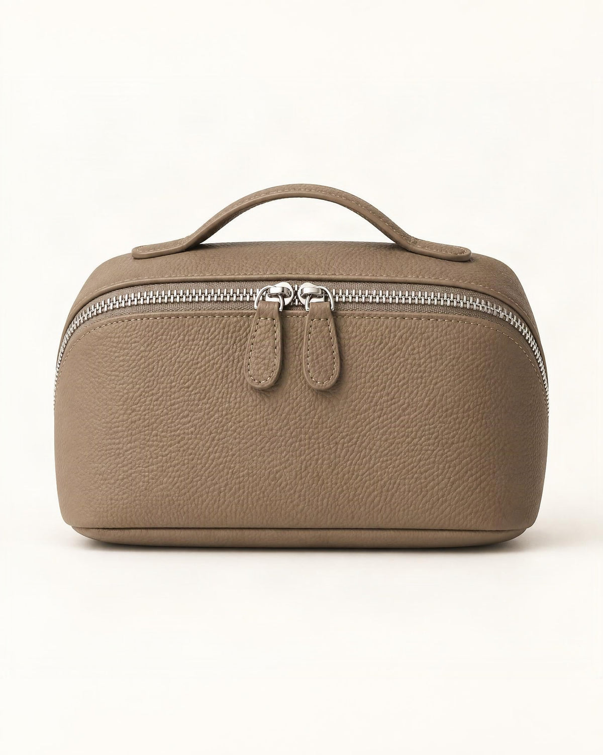 Cowhide Leather Travel Pouch with Top Handle — straight-on front view on a warm white background