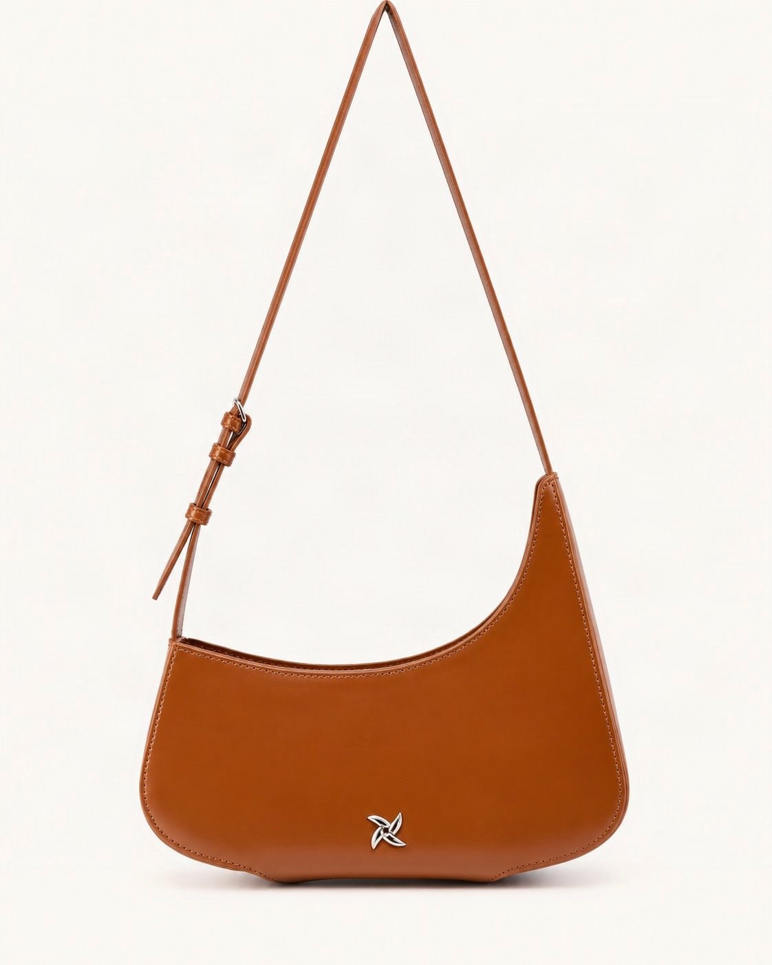 Cowhide Leather Crescent Shoulder Bag — straight-on front view on a warm white background