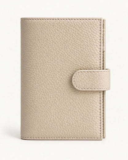 Leather Passport Holder Wallet with Pen Slot — straight-on front view on a warm white background
