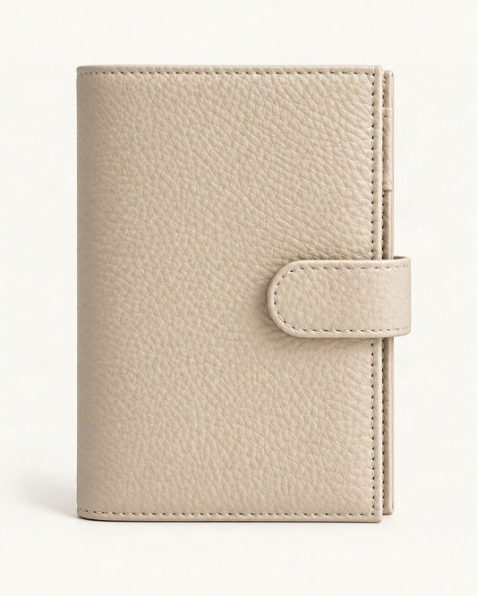 Leather Passport Holder Wallet with Pen Slot — straight-on front view on a warm white background