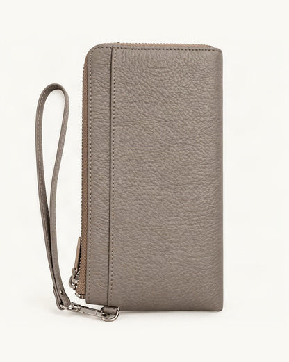 RFID-Blocking Pebbled Cowhide Long Zip Clutch — straight-on front view on a warm white background