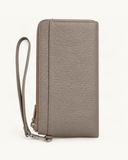 RFID-Blocking Pebbled Cowhide Long Zip Clutch — straight-on front view on a warm white background