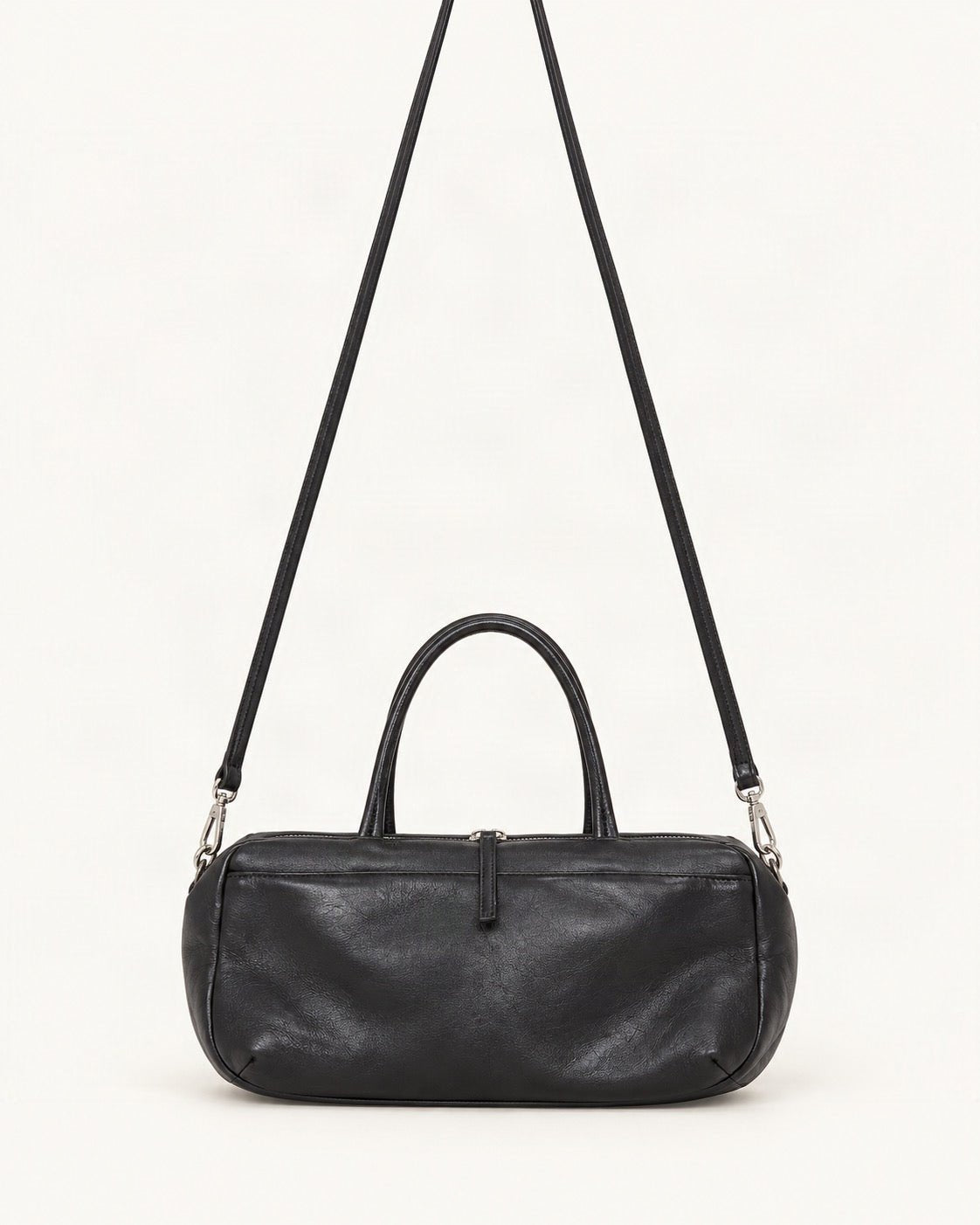 Lambskin Small Boston Bag — straight-on front view on a warm white background