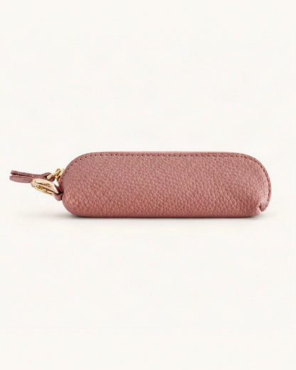 Top-Grain Cowhide Mini Zip Coin Purse with Key Clip — straight-on front view on a warm white background