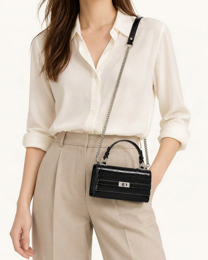 Crocodile-Embossed Cowhide Leather Envelope Crossbody Bag worn crossbody