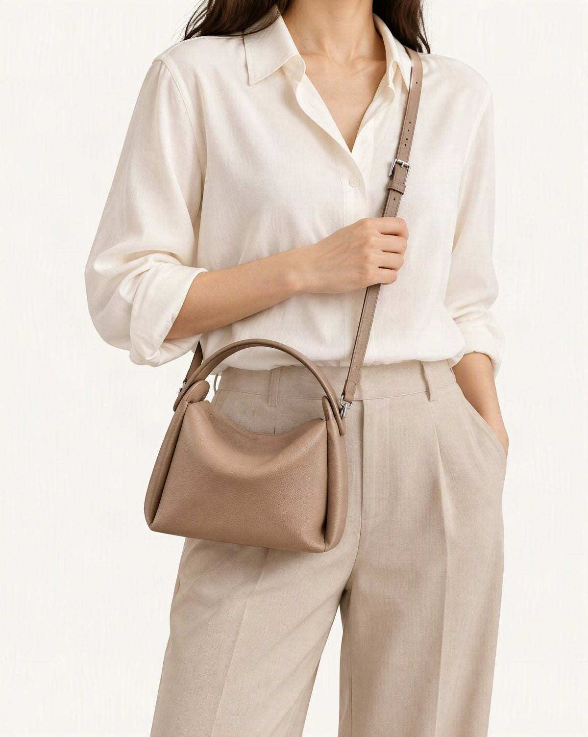 Pebbled Cowhide Leather Small Top-Handle Crossbody Bag worn crossbody