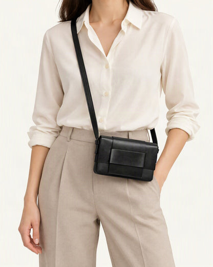 Cowhide Leather Mini Crossbody Bag with Bow Detail worn crossbody