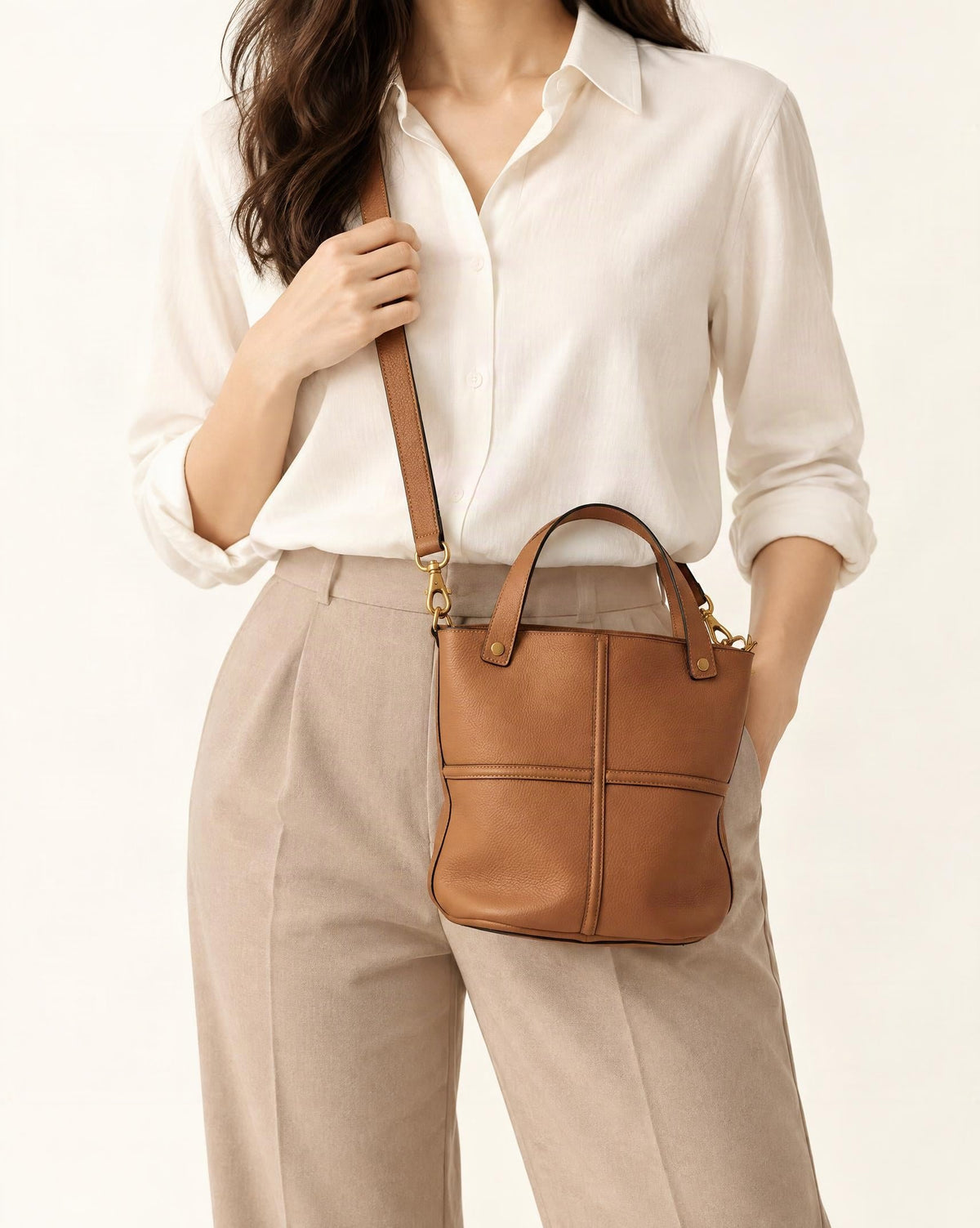Top-Grain Cowhide Bucket Bag with Detachable Crossbody Strap worn crossbody