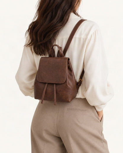 Split Cowhide Mini Backpack worn as a backpack