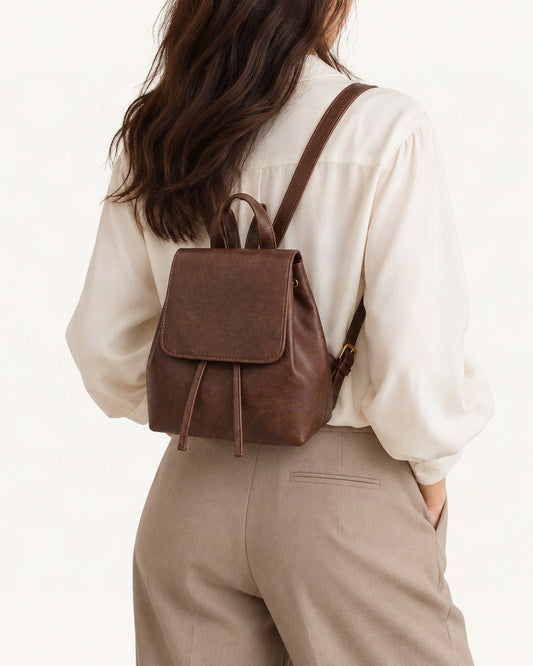 Split Cowhide Mini Backpack worn as a backpack
