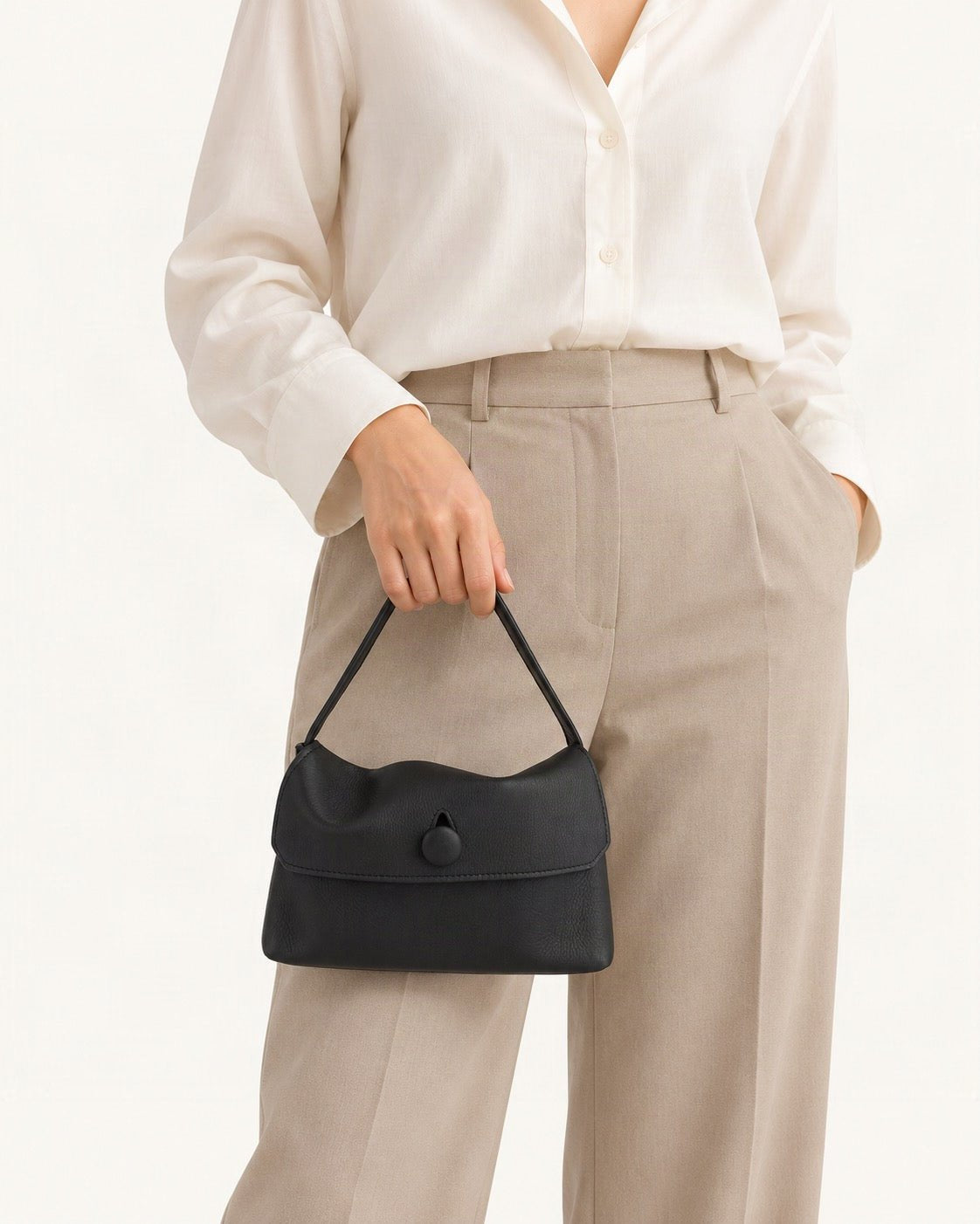 Lambskin Mini Shoulder Bag with Button Flap worn on the shoulder