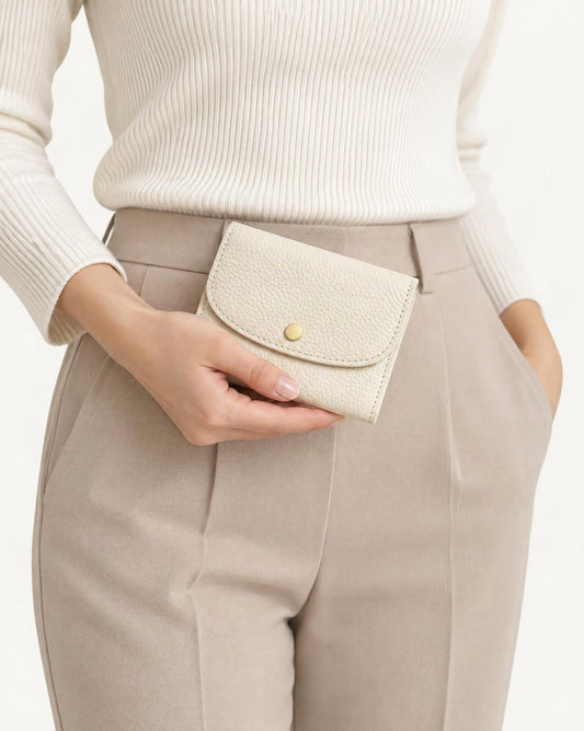 Cowhide Mini Coin Purse Wallet with RFID Card Slots held in hand by a model