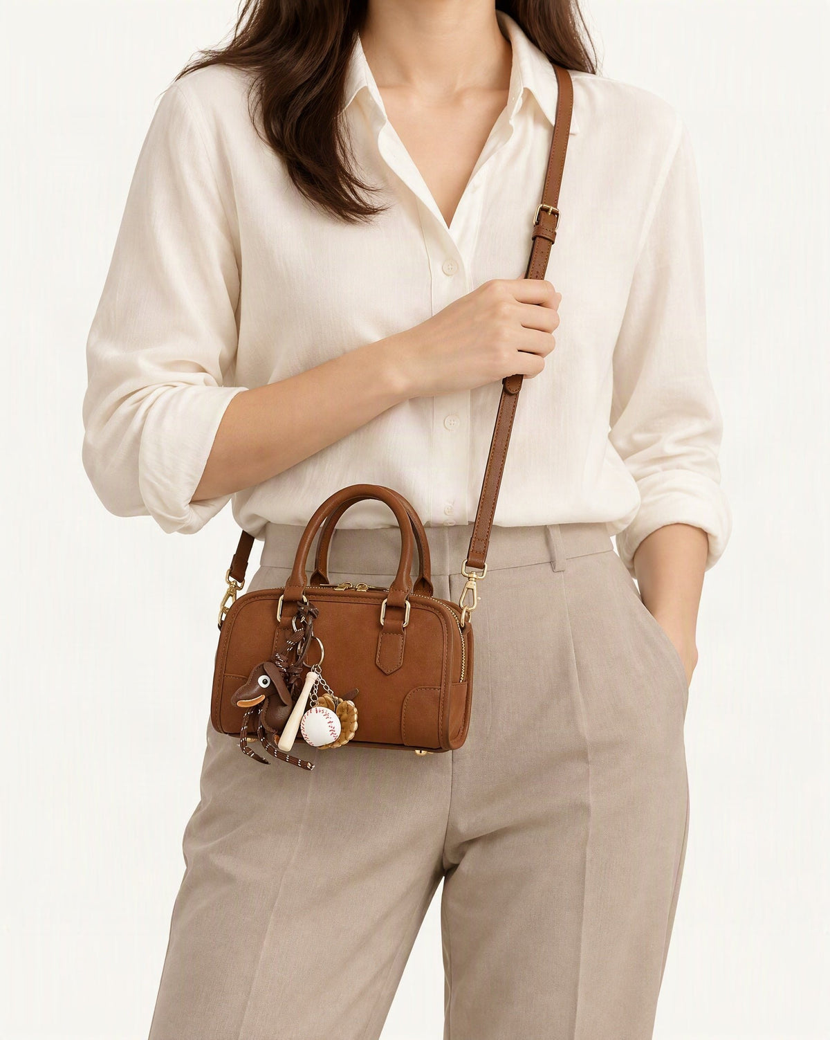 Split Leather Small Bowling Bag worn crossbody