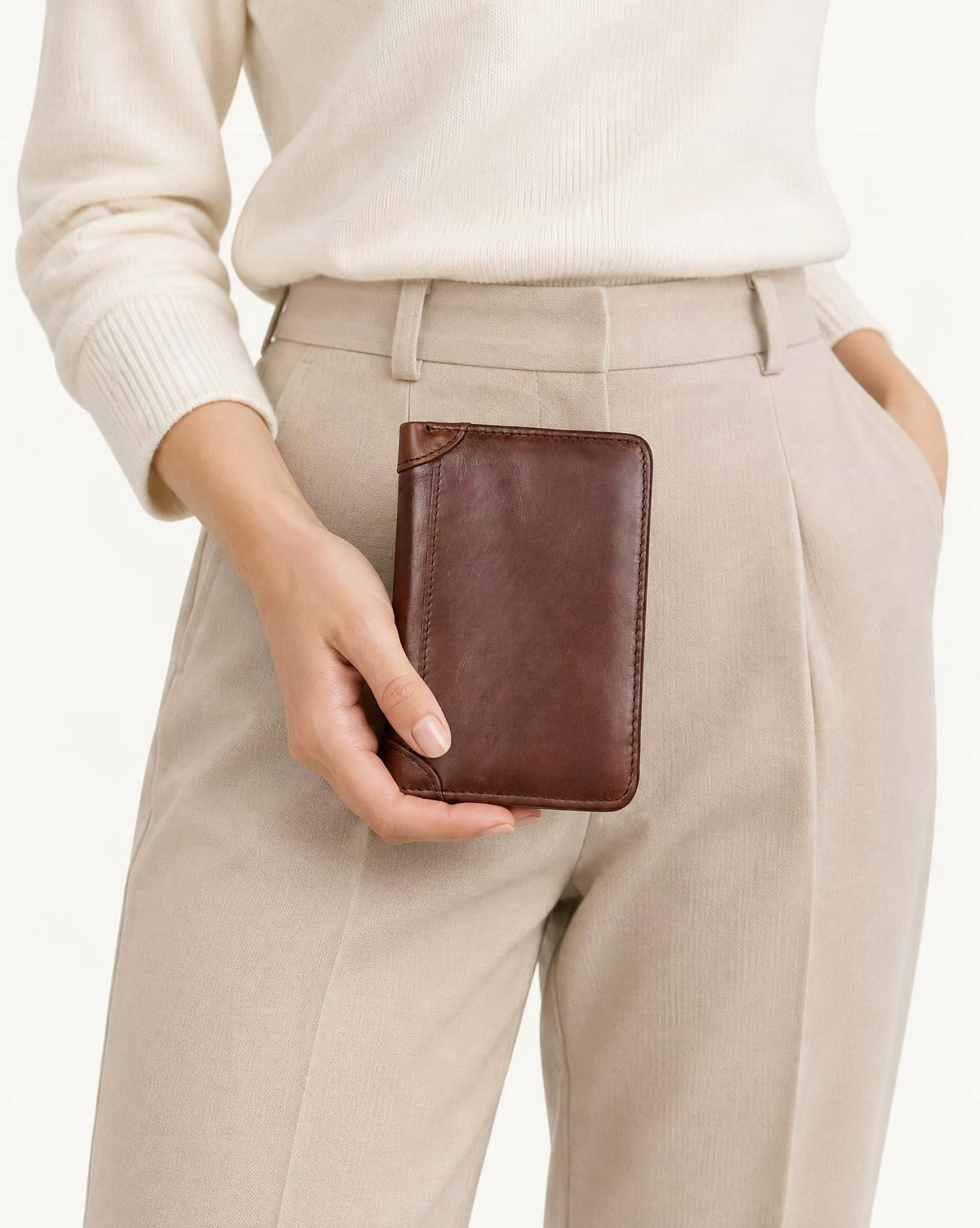 Cowhide Leather Bifold Wallet with Card Slots held in hand by a model
