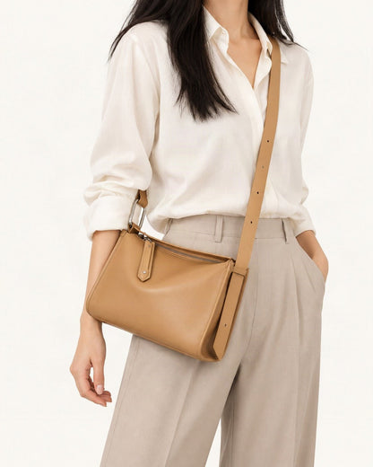 Cowhide Leather Pillow Crossbody Bag worn crossbody