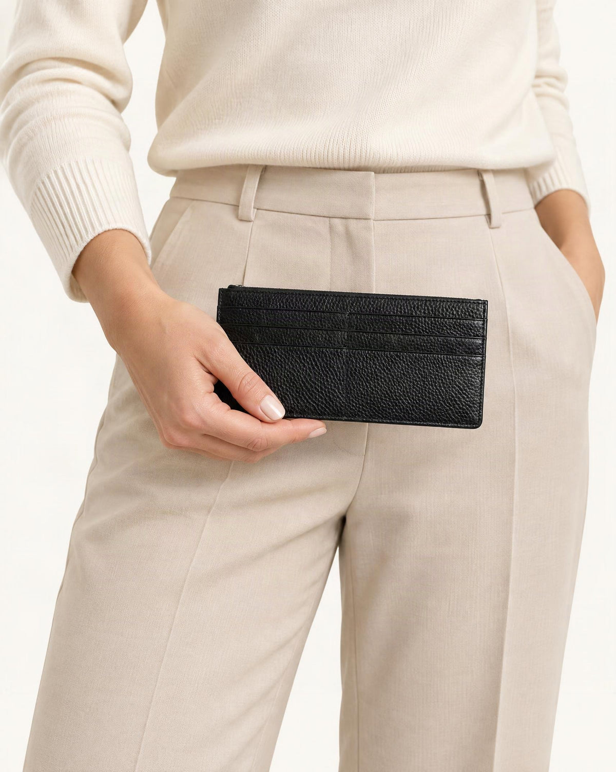 Cowhide Leather Slim Long Wallet with 6 Card Slots held in hand by a model