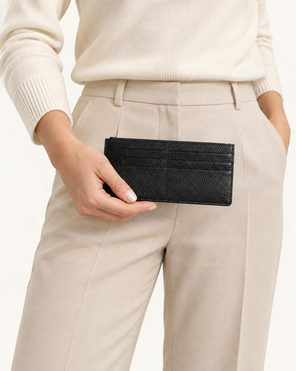 Cowhide Leather Slim Long Wallet with 6 Card Slots held in hand by a model