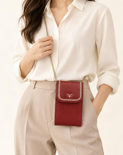 Top-Grain Cowhide Micro Crossbody Phone Bag with Chain Strap worn crossbody