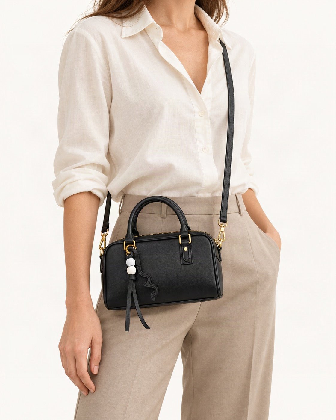 Cowhide Leather Double-Handle Pillow Crossbody Bag worn crossbody