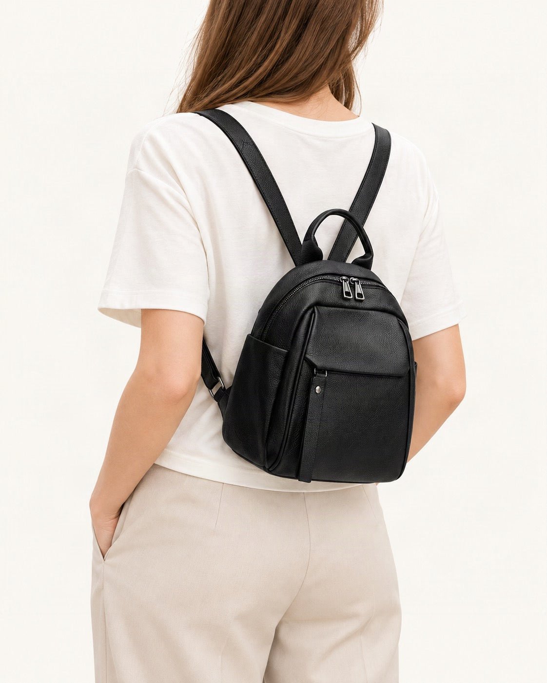 Top-Grain Cowhide Backpack with Multiple Pockets worn as a backpack