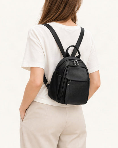 Top-Grain Cowhide Backpack with Multiple Pockets worn as a backpack