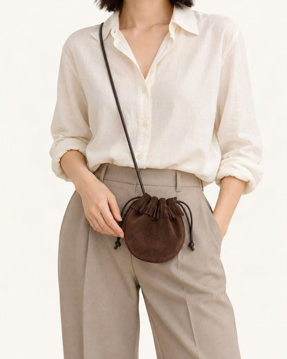 Suede Cowhide Micro Bucket Bag worn crossbody