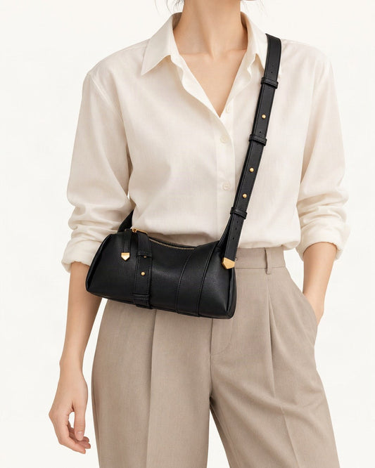 Cowhide Soft Pillow Crossbody Bag with Adjustable Wide Strap worn crossbody