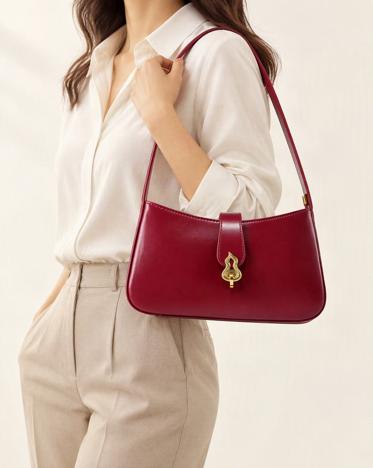 Cowhide Leather Small Shoulder Bag with Gourd Lock Clasp worn crossbody
