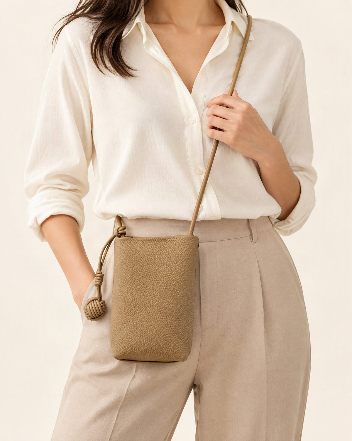 Cowhide Leather Micro Bucket Phone Crossbody Bag worn crossbody