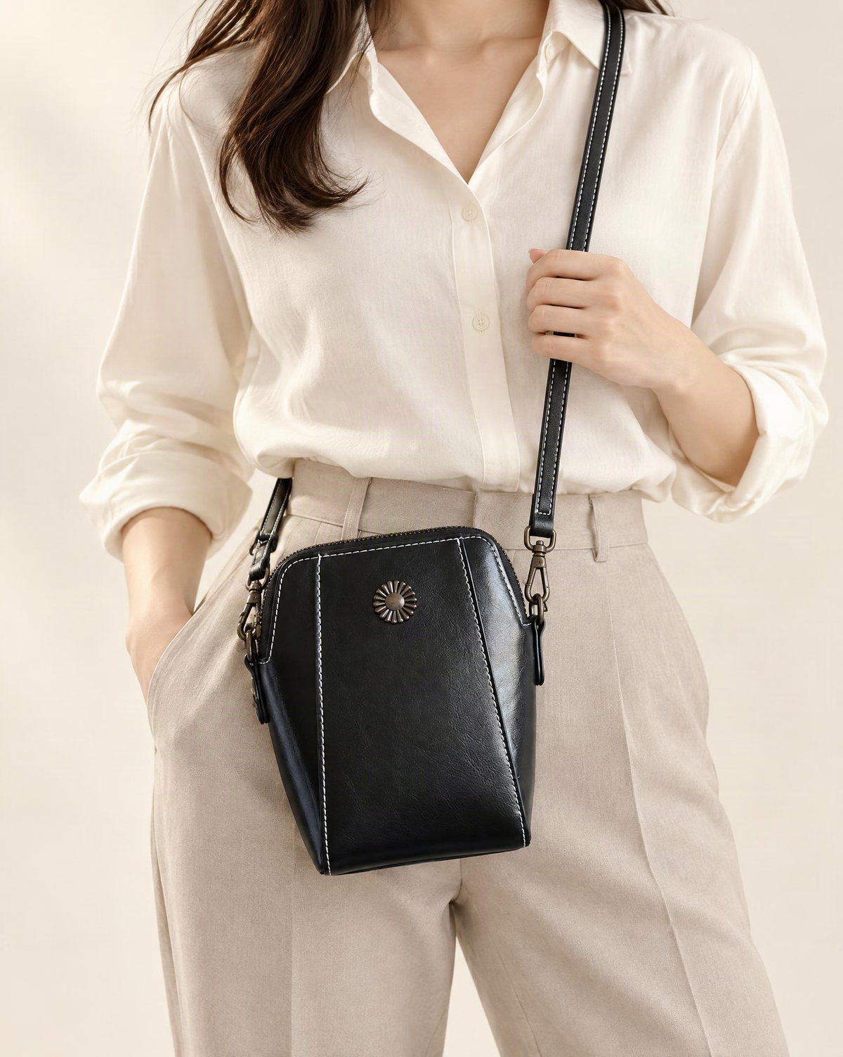 Cowhide Leather Micro Crossbody Phone Bag with Zip Closure worn crossbody