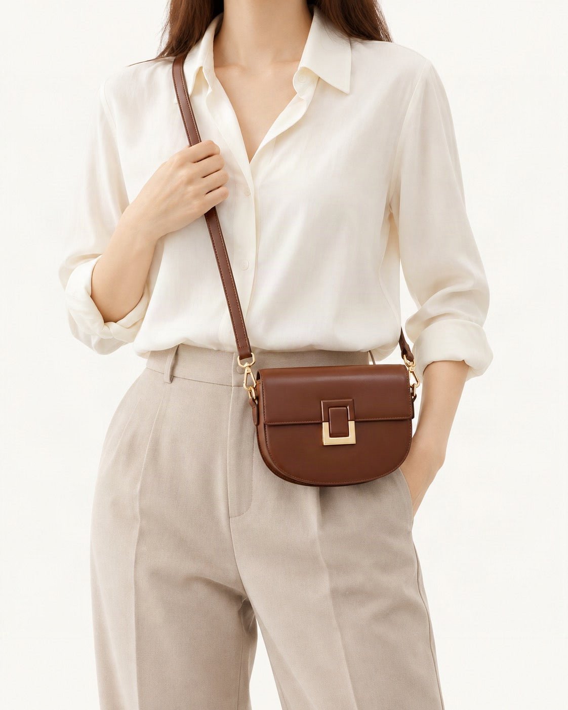 Cowhide Mini Saddle Crossbody Bag worn crossbody
