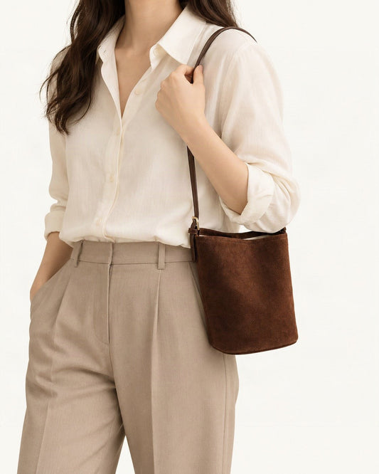 Suede Cowhide Bucket Shoulder Bag worn on the shoulder