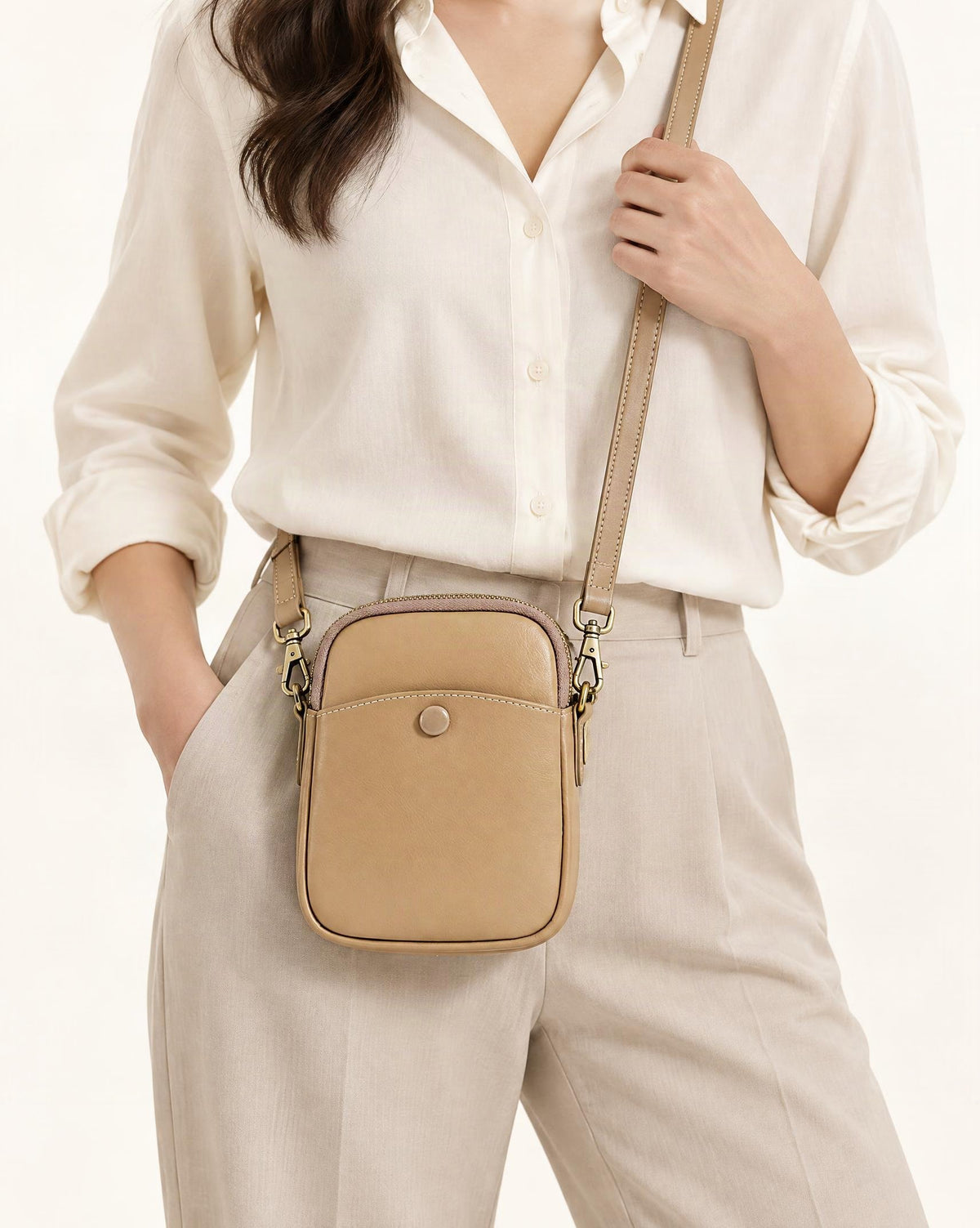 Cowhide Leather Micro Crossbody Bag with Adjustable Strap worn crossbody