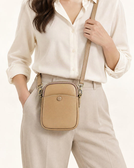 Cowhide Leather Micro Crossbody Bag with Adjustable Strap worn crossbody