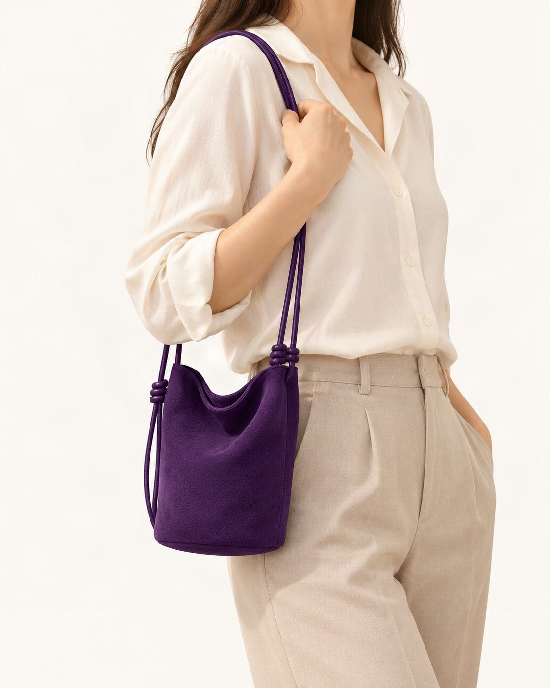 Nubuck Cowhide Mini Bucket Shoulder Bag worn on the shoulder