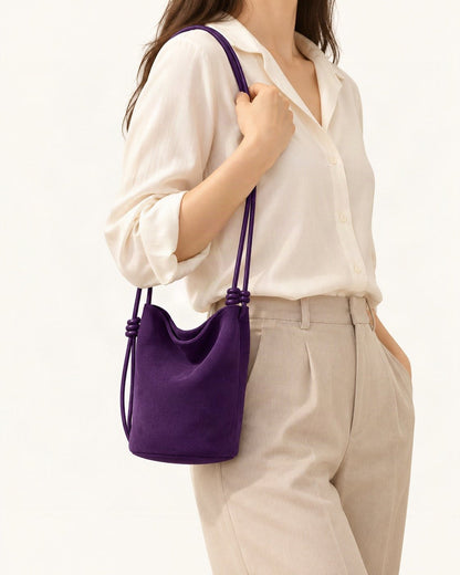 Nubuck Cowhide Mini Bucket Shoulder Bag worn on the shoulder