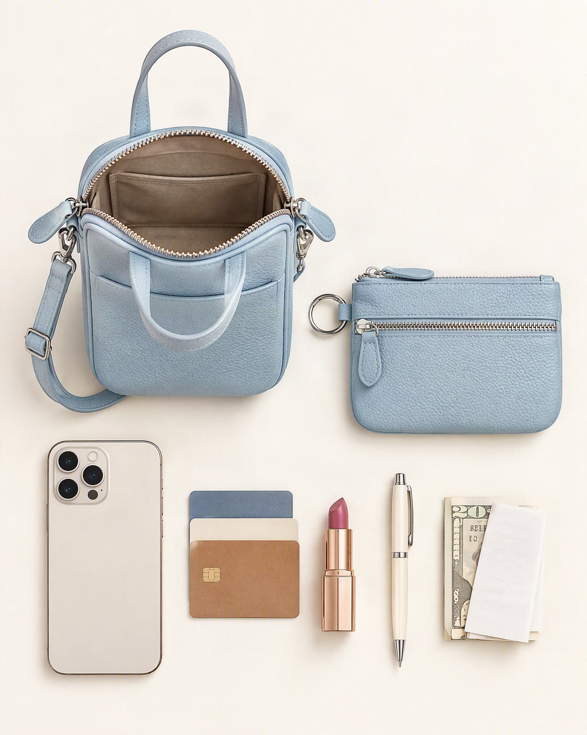 What fits in the Pebbled Cowhide Micro Crossbody Bag: phone, cards, lipstick, pen, folded notes and the detachable pouch