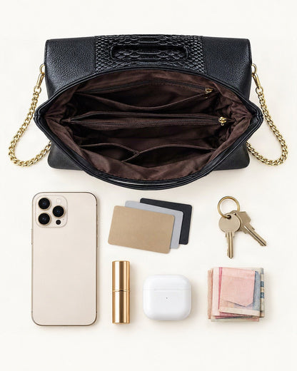 What fits in the Top-Grain Cowhide Envelope Clutch: smartphone up to 6.9 in, cards, keys, a lipstick, airpods in their case, a few banknotes folded over into a small stack, no complete flat bill face showing