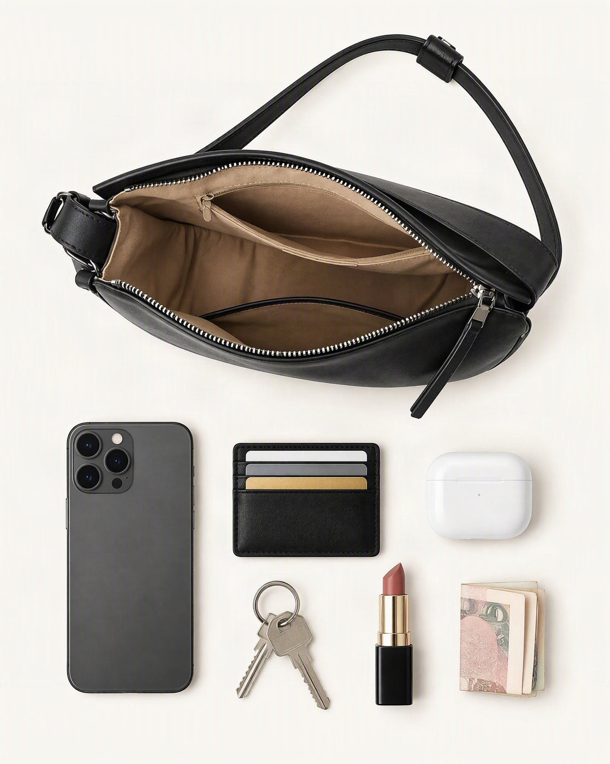 What fits in the Cowhide Leather Small Plus Hobo Shoulder Bag: smartphone up to 6.9 in, cards, keys, a lipstick, airpods in their case, a few banknotes folded over into a small stack, no complete flat bill face showing