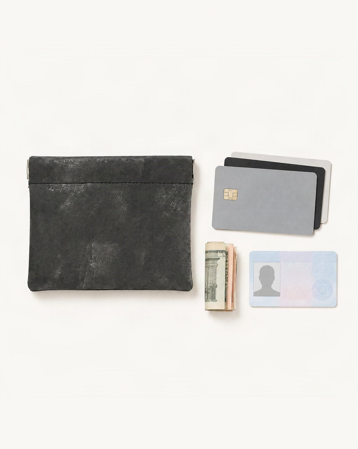What fits in the Satin Cowhide Mini Card Pouch with Spring Clasp Closure: cards, a few banknotes folded over into a small stack, no complete flat bill face showing, an id card