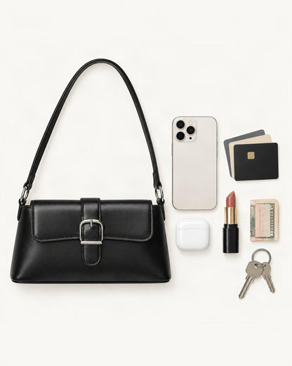 What fits in the Genuine Leather Baguette Shoulder Bag with Metal Buckle: smartphone up to 6.9 in, cards, keys, a lipstick, airpods in their case, a few banknotes folded over into a small stack, no complete flat bill face showing