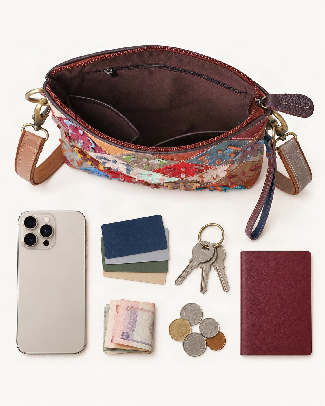 What fits in the Top-Grain Cowhide Small Shoulder Bag – Multicolor Patchwork: smartphone up to 6.9 in, cards, keys, a few banknotes folded over into a small stack, no complete flat bill face showing, coins, a passport